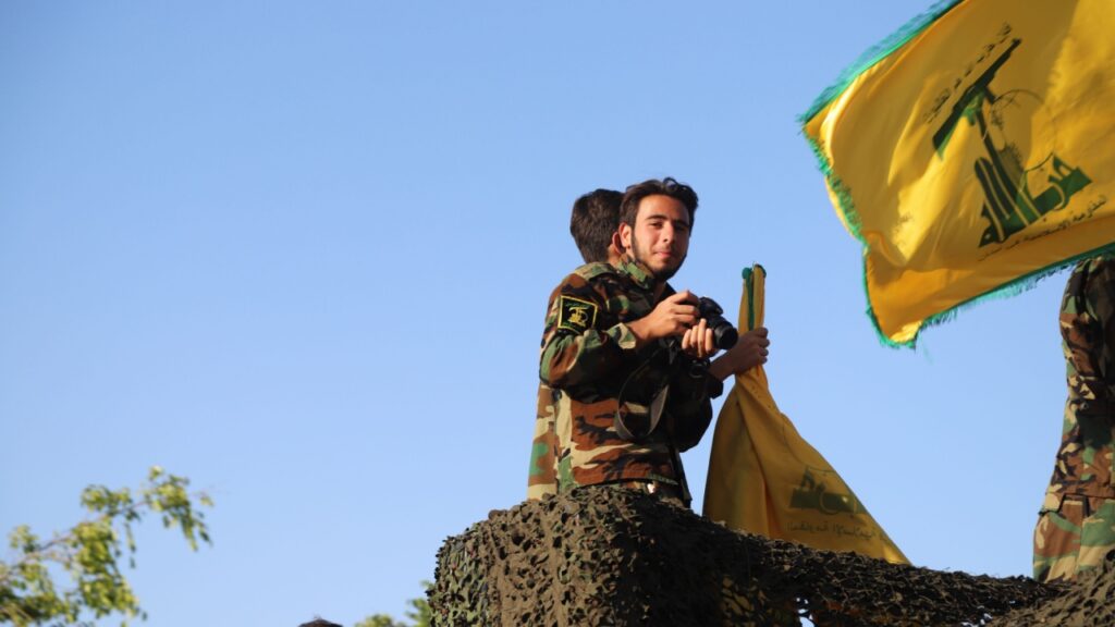 May 25, 2021: A Hezbollah fighter with flags and military clothes at Liberation Day.